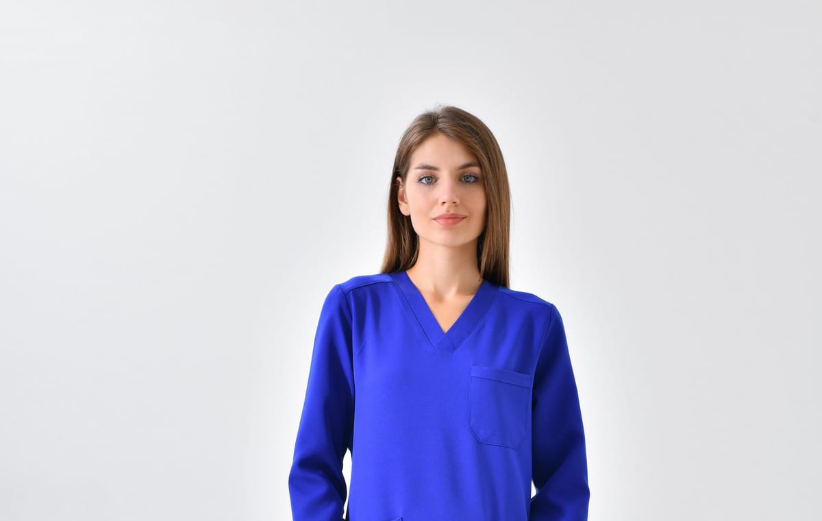 Royal blue long-sleeve scrub top, front